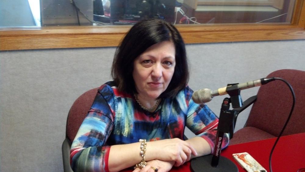 Dr. Athanasia Landis interviewed at a radio station