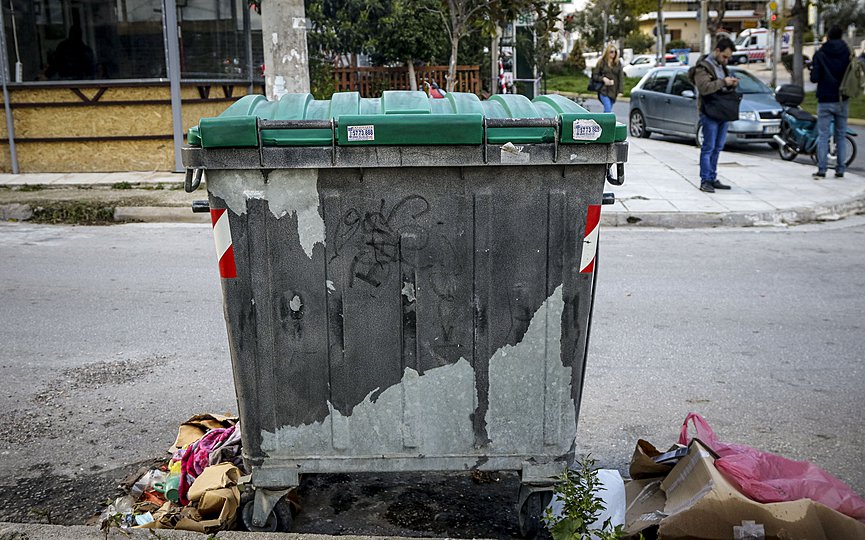 FILE - The dead body of a baby was found in a rubbish bin in Petroupolis, Athens, on Monday, Feb. 26, 2018. (Photo by Eurokinissi/Yiannis Panagopoulos)