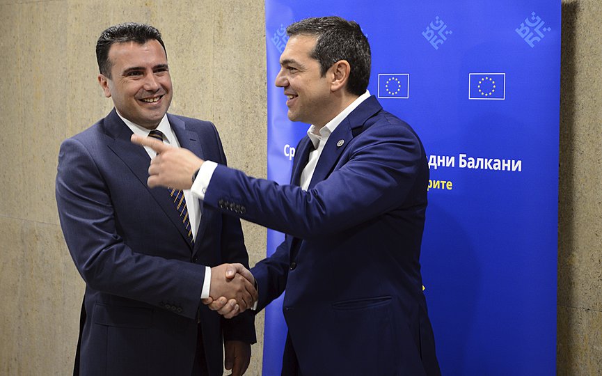 FILE - FYROM's Prime Minister Zoran Zaev, left, speaks with Greek Prime Minister Alexis Tsipras (AP Photo, FILE)