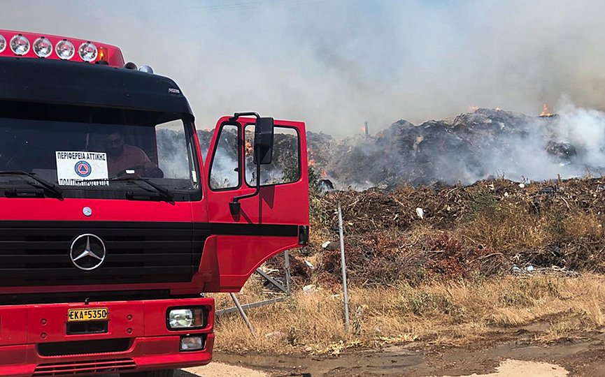 FILE - Wildfire near an arms factory in Lavrio some 50 kilometers (30 miles) from Athens. (Photo by Eurokinissi)