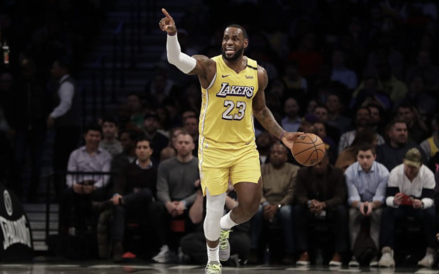 Los Angeles Lakers' LeBron James (23) calls out to his teammates during the first half of an NBA basketball game against the Brooklyn Nets Thursday, Jan. 23, 2020, in New York. (AP Photo/Frank Franklin II)