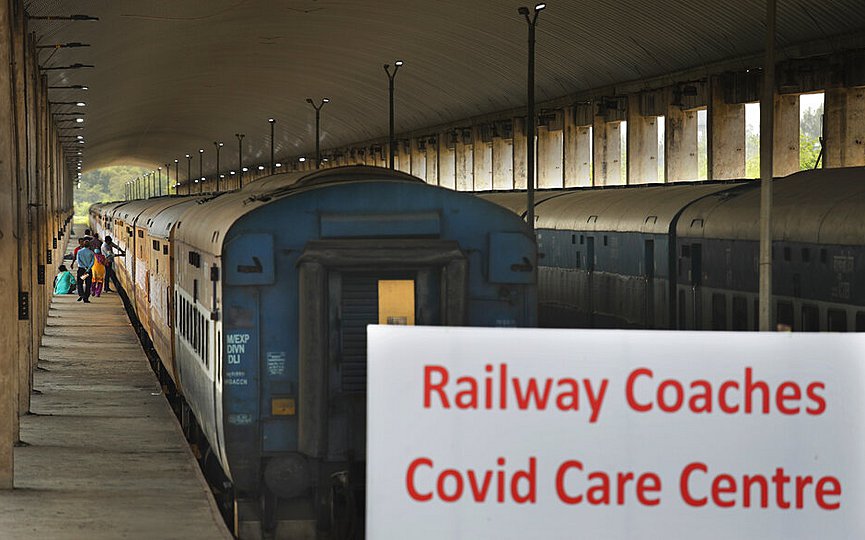 Workers prepare railway carriages for use as makeshift coronavirus hospital wards as the Indian capital struggles to contain a spike in cases. in New Delhi, India, Monday, June 15, 2020. (AP Photo/Manish Swarup)
