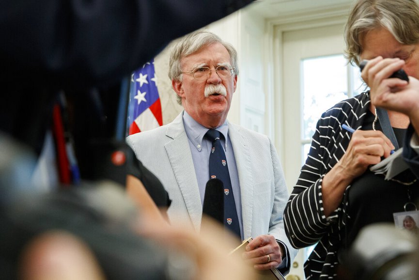FILE - In this July 19, 2019, file photo, then-National security adviser John Bolton speaks at the request of President Donald Trump during a photo opportunity in the Oval Office of the White House in Washington. (AP Photo/Alex Brandon, File)