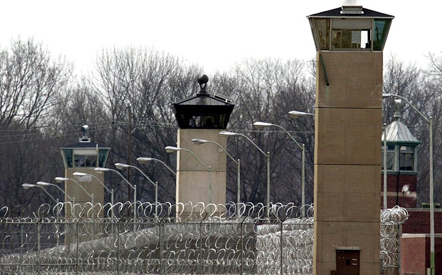 FILE - In this March 17, 2003 file photo, guard towers and razor wire ring the compound at the U.S. Penitentiary in Terre Haute, Ind., the site of the last federal execution. (AP Photo/Michael Conroy, File)