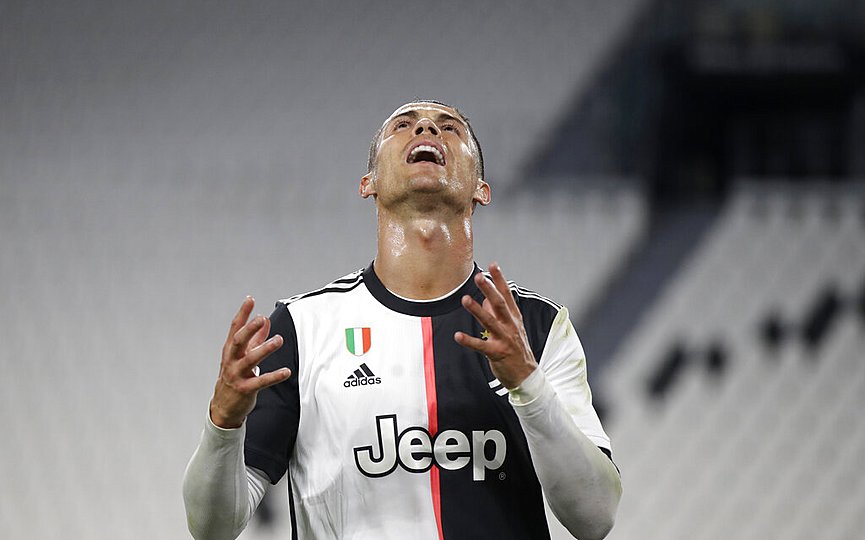 Juventus  Cristiano Ronaldo reacts during an Italian Cup second leg soccer match between Juventus and AC Milan at the Allianz stadium, in Turin, Italy, Friday, June 12, 2020. (AP Photo/Luca Bruno)