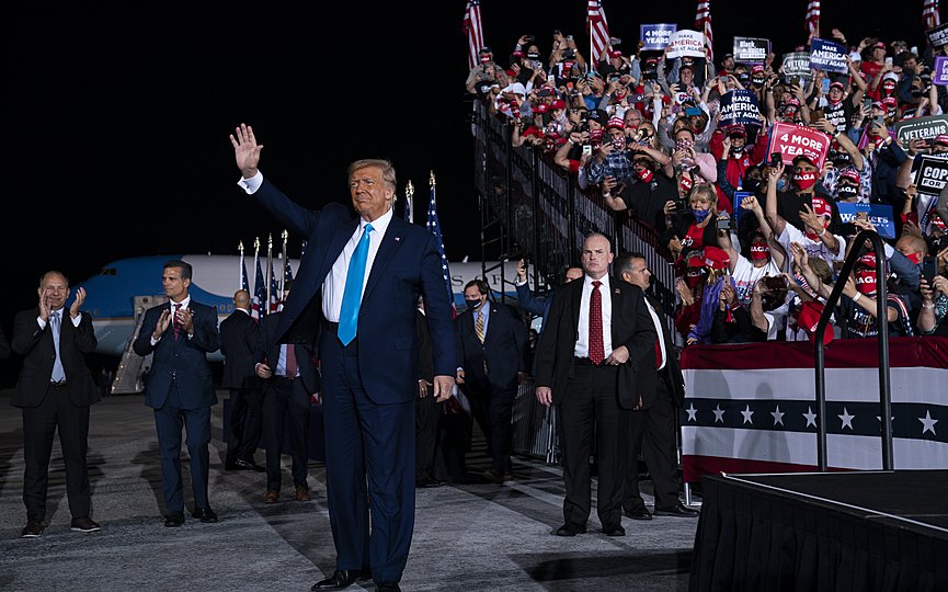 President Donald Trump arrives for a campaign rally at Harrisburg International Airport, Saturday, Sept. 26, 2020, in Middletown, Pa. (AP Photo/Evan Vucci)