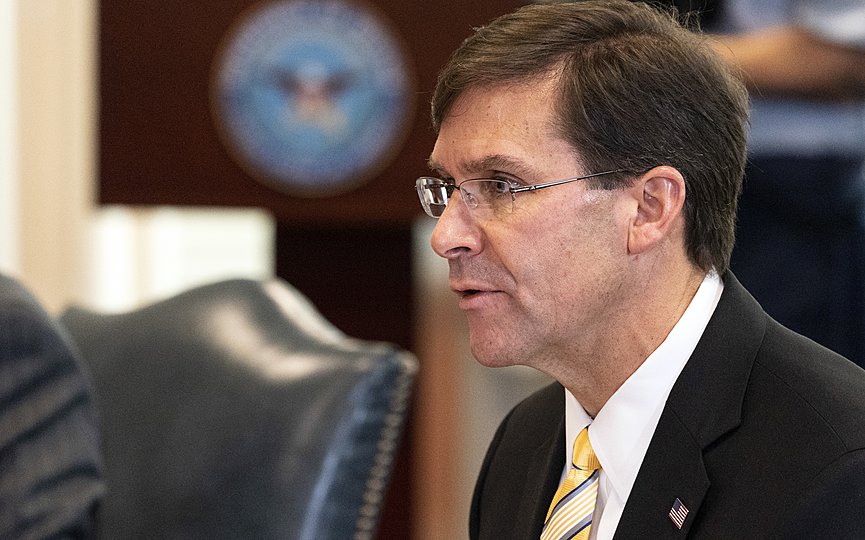 FILE - In this Oct. 8, 2020, file photo, Secretary of Defense Mark Esper speaks before a meeting with Romanian Defense Minister Nicolae Ciuca, at the Pentagon, in Washington. (AP Photo/Alex Brandon, File)