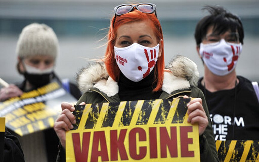 People march demanding the resignation of the government over the poor handling of the coronavirus pandemic in the capital Sarajevo, Bosnia, Tuesday, April 6, 2021. (AP Photo/Kemal Softic)