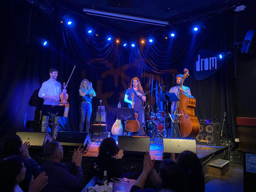 The band Sounds of Cyprus, (left to right:) Alex Tasopoulos, Elena Chris, Peter Douskalis, and Erikos Vlesmas, take their bows at Drom on Manhattan’s Lower East Side on June 11. Photo by Eleni Sakellis