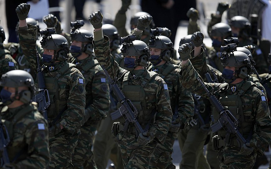 Members of the Greek Army parade in front of the Greek Parliament in Athens, Thursday, March 25, 2021. (AP Photo/Thanassis Stavrakis)
