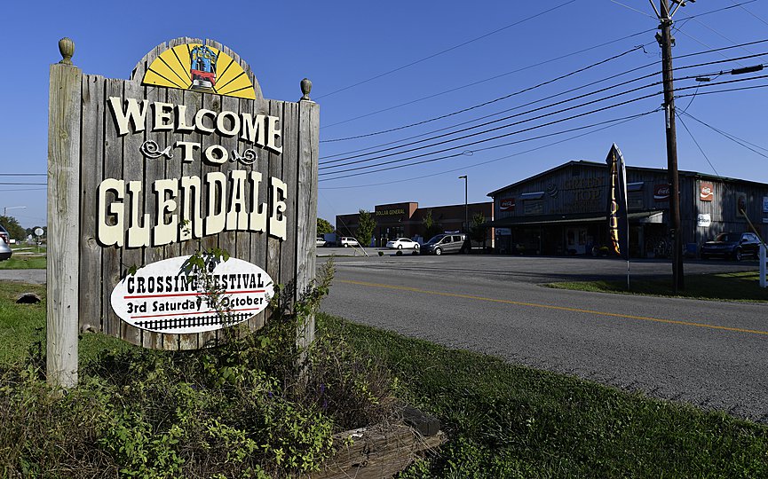 A sign welcomes visitors to the tiny town of Glendale, Ky., the site of a joint venture with Ford Motor Company and SK Innovation to create the $5.8 billion BlueOvalSK Battery Park in Glendale, Ky., Monday, Sept. 27, 2021. (AP Photo/Timothy D. Easley)