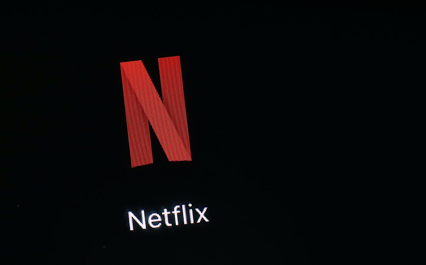 FILE - This March 19, 2018, file photo shows the Netflix app on an iPad in Baltimore. Netflix reports earnings Wednesday, July 17, 2019. (AP Photo/Patrick Semansky, File)