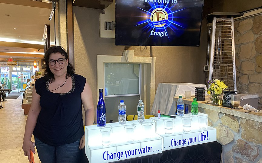 Marina Fakiris gave a presentation on Kangen Water at Victory Sweet Shop in Astoria. Photo by Eleni Sakellis