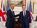 Britain's Prime Minister David Cameron, right, shakes hands with US President Barack Obama, during the president's visit to 10 Downing Street for bilateral talks, in London, Friday, April 22, 2016. Lending political backup to a struggling friend, President Barack Obama made an impassioned plea to Britons to heed Prime Minister David Cameron's call to stay in the European Union and dismissed critics who accused the U.S. president of meddling in British affairs. (Ben Gurr/Pool Photo via AP)